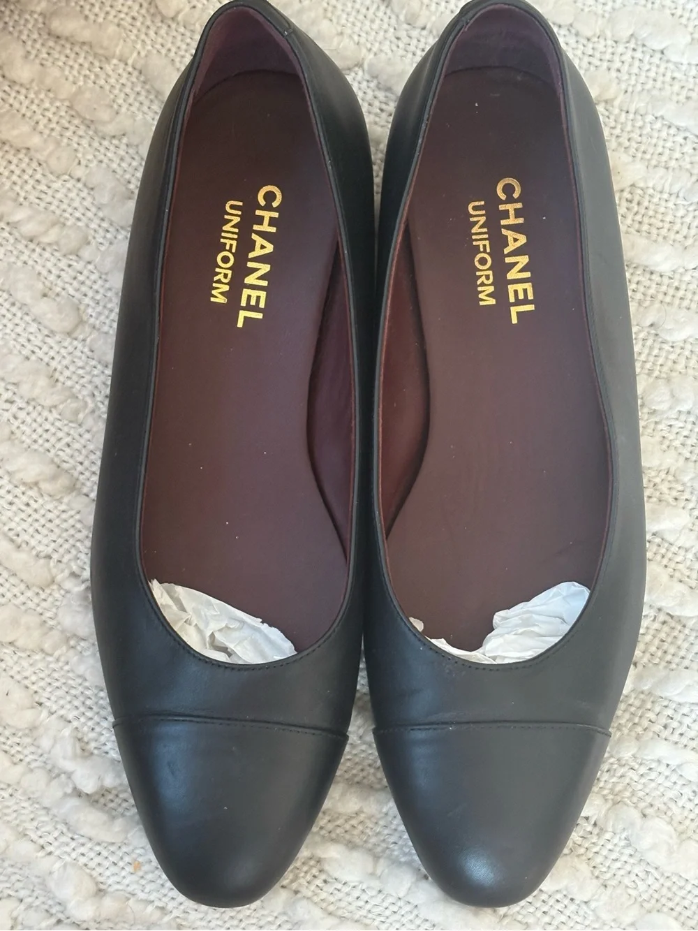 CHANEL Black Leather Ballet Flats with Gold CC Heel Accent